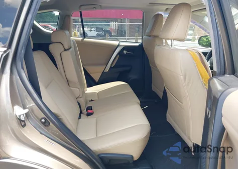 2013 Toyota Rav4 Limited z USA, uszkodzony, nr VIN JTMYFREV0DD011783